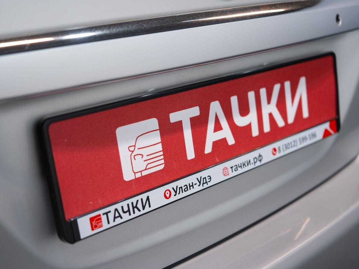 Nissan Tiida 2011 - фото автомобиля