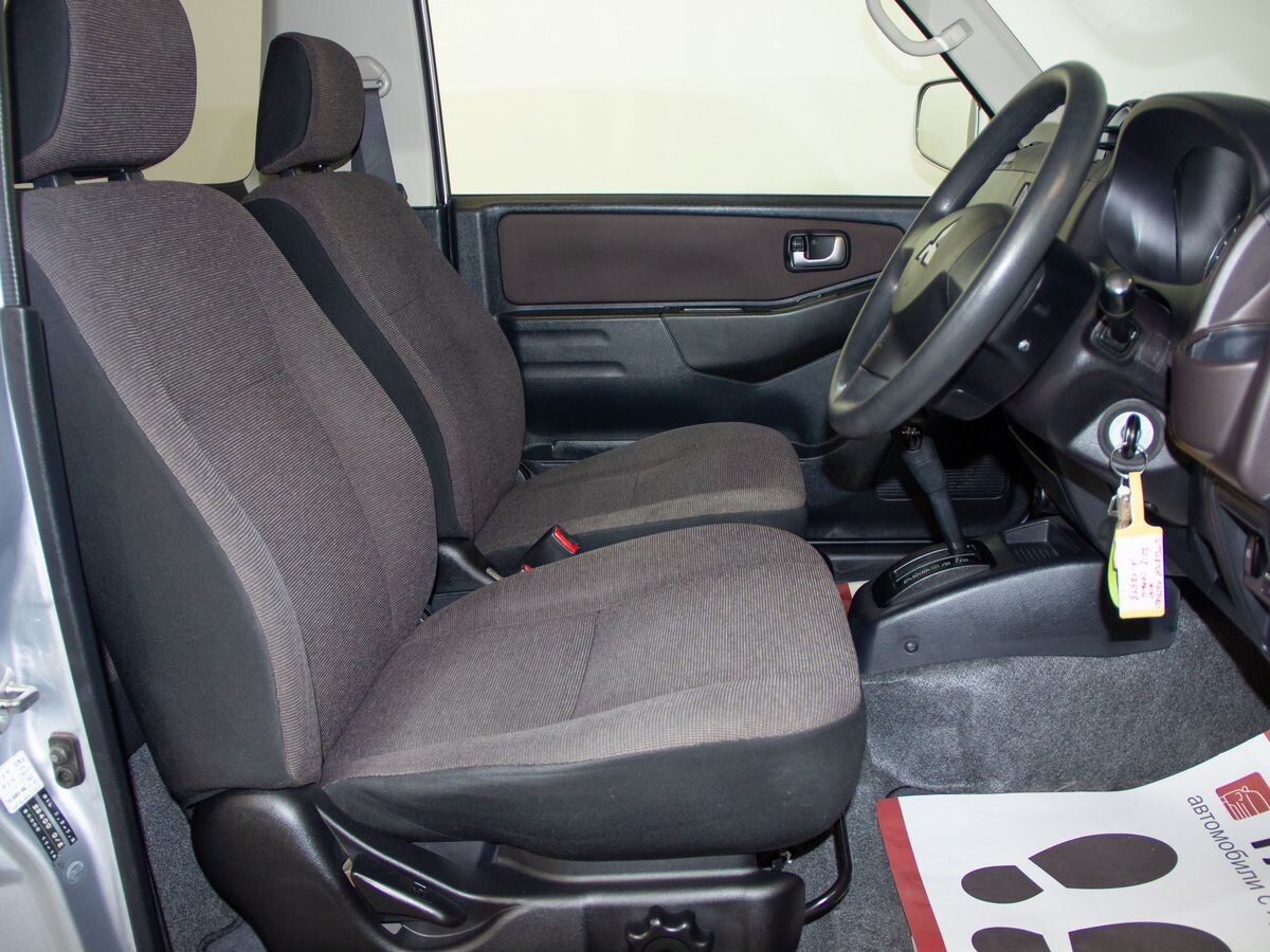 Mitsubishi Pajero Mini 2012 - фото автомобиля