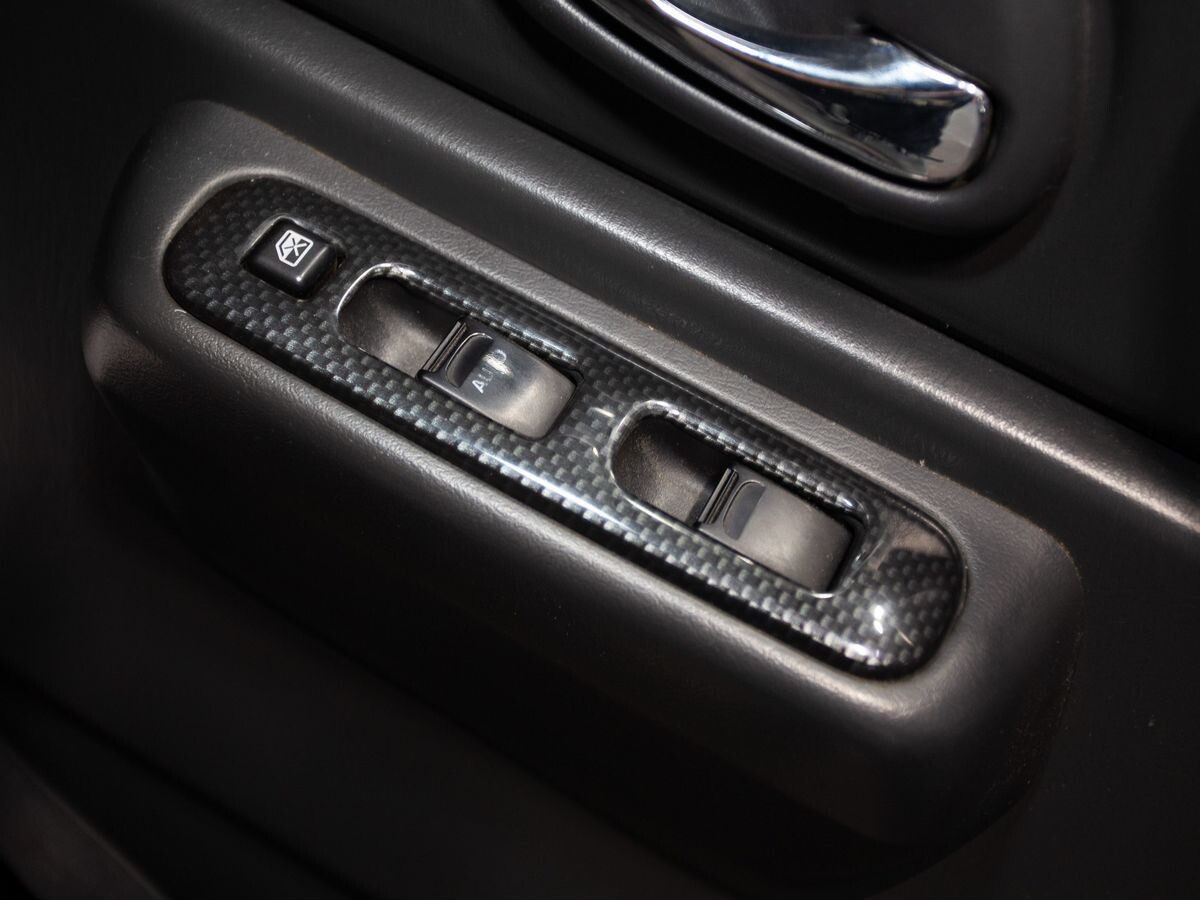 Suzuki Jimny 2010 - фото автомобиля