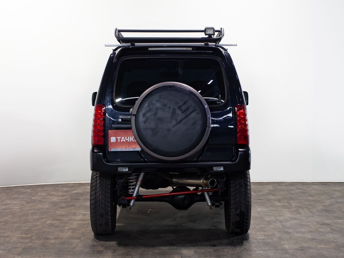 Suzuki Jimny 2010 - фото автомобиля