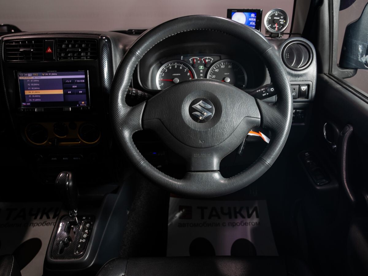 Suzuki Jimny 2010 - фото автомобиля