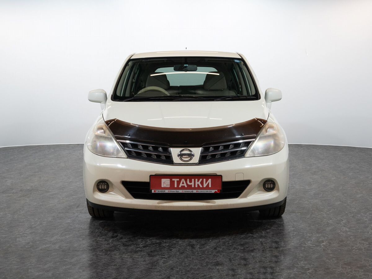 Nissan Tiida 2010 - фото автомобиля