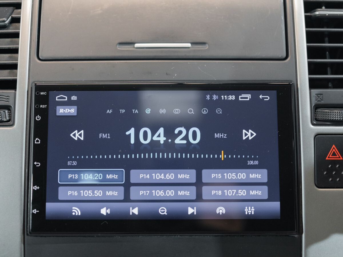 Nissan Tiida 2010 - фото автомобиля