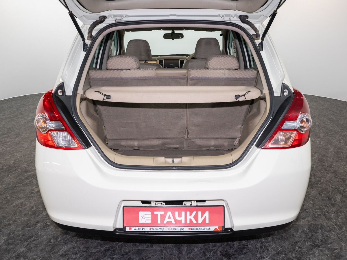 Nissan Tiida 2010 - фото автомобиля