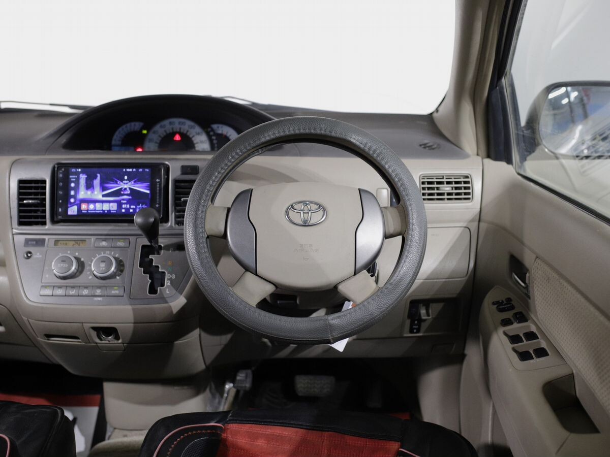 Toyota Raum 2009 - фото автомобиля