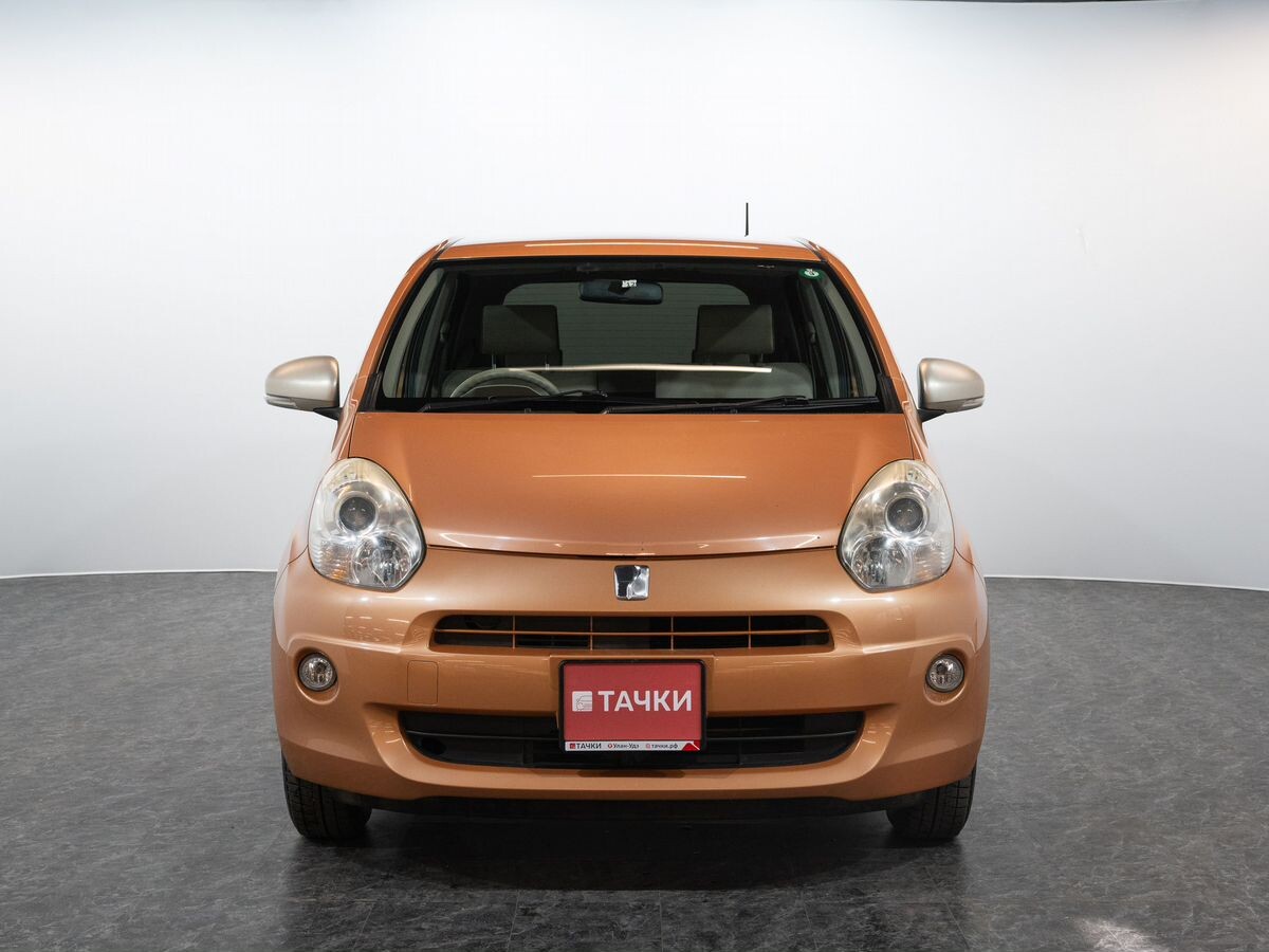 Toyota Passo 2010 - фото автомобиля