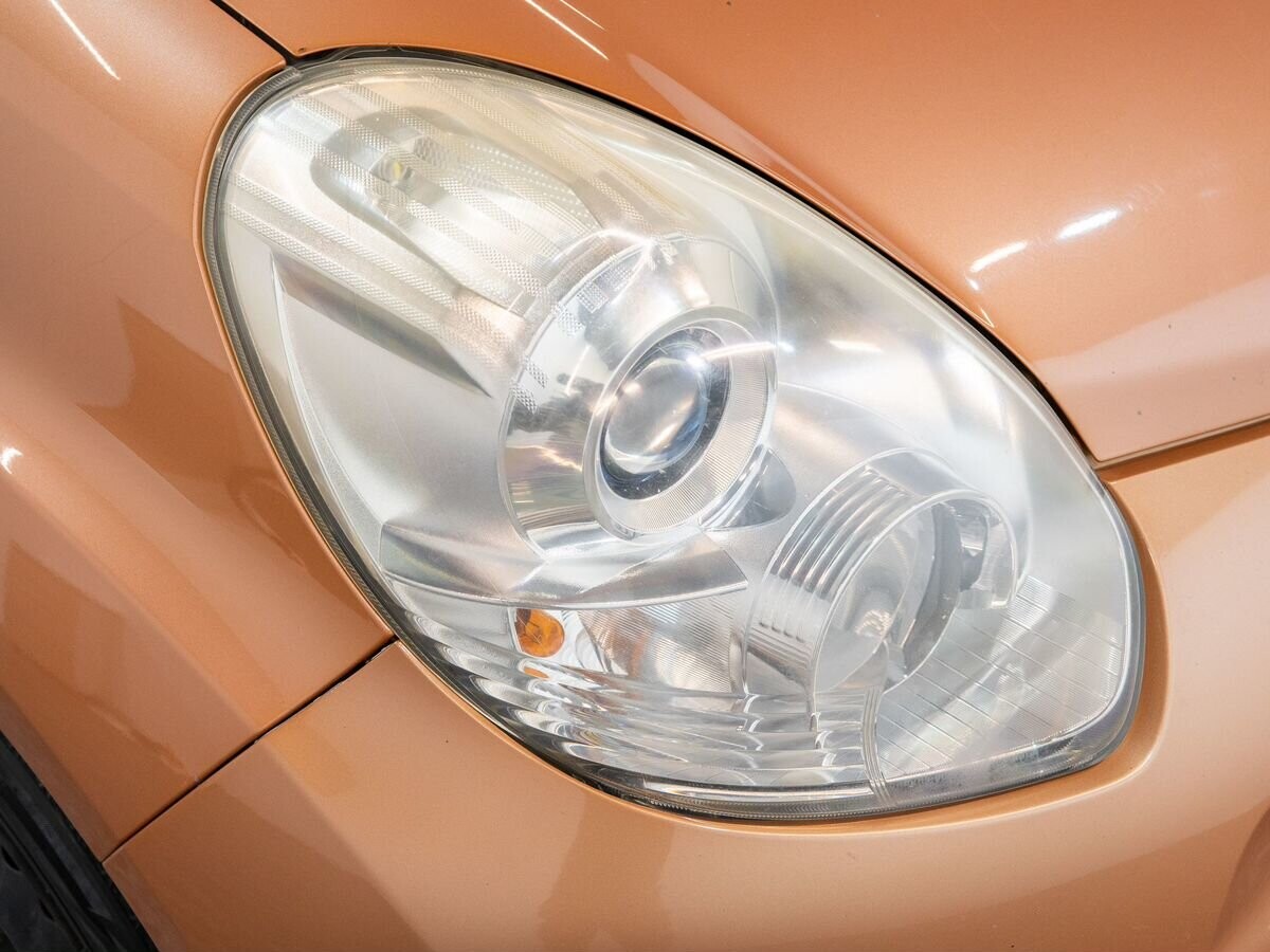 Toyota Passo 2010 - фото автомобиля