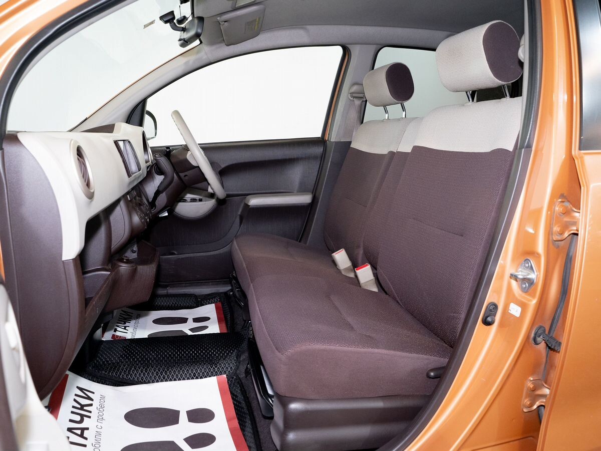 Toyota Passo 2010 - фото автомобиля