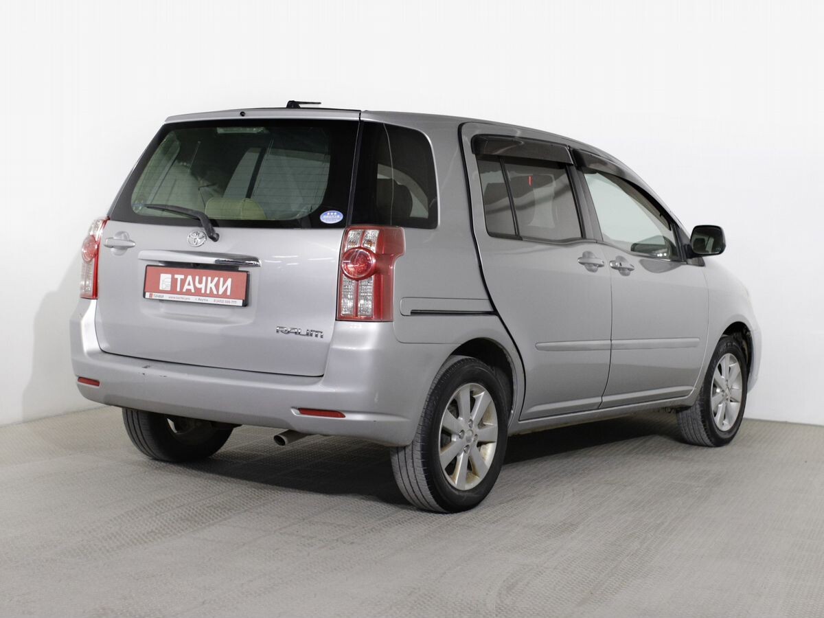 Toyota Raum 2010 - фото автомобиля