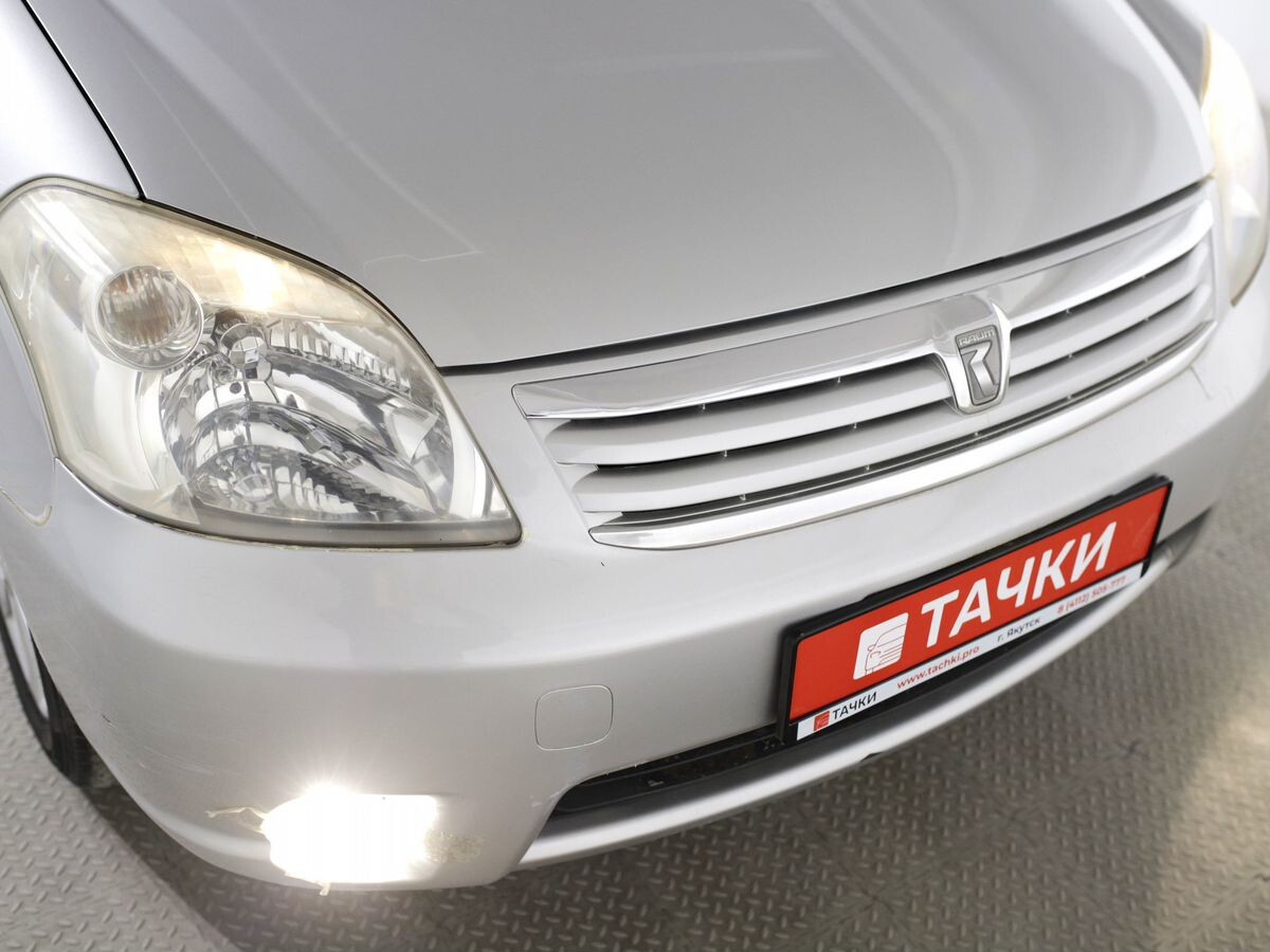 Toyota Raum 2010 - фото автомобиля