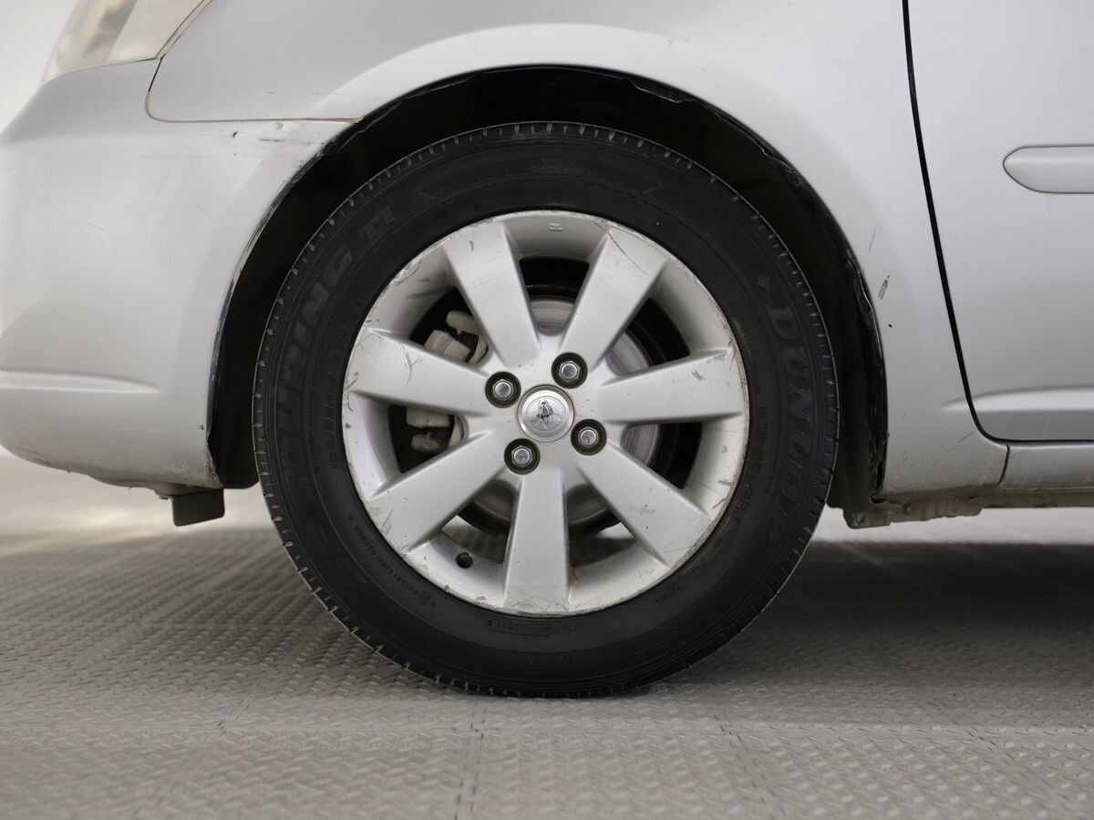 Toyota Raum 2010 - фото автомобиля