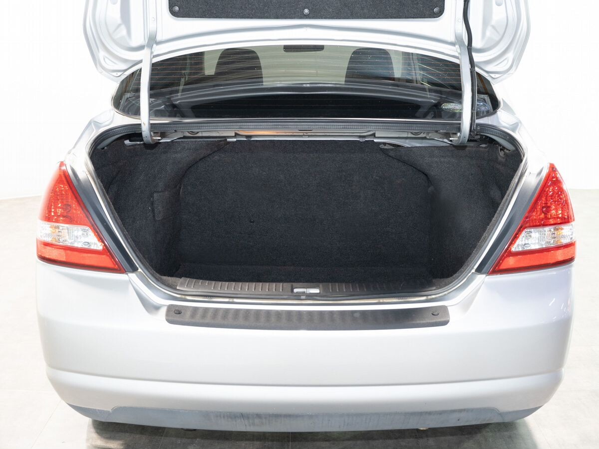 Nissan Tiida 2009 - фото автомобиля