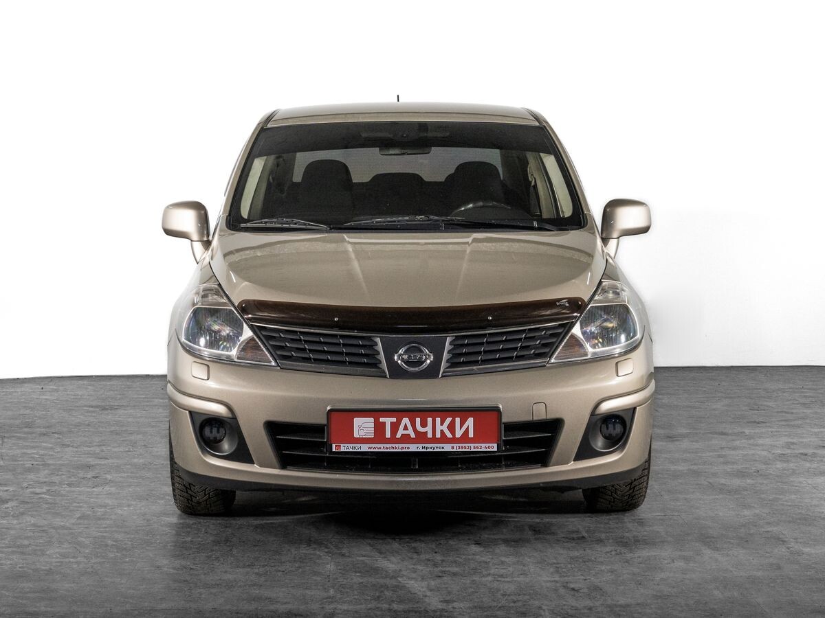 Nissan Tiida 2010 - фото автомобиля