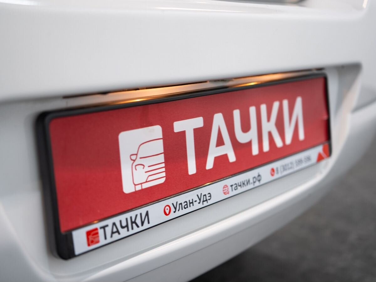 Nissan Tiida 2011 - фото автомобиля