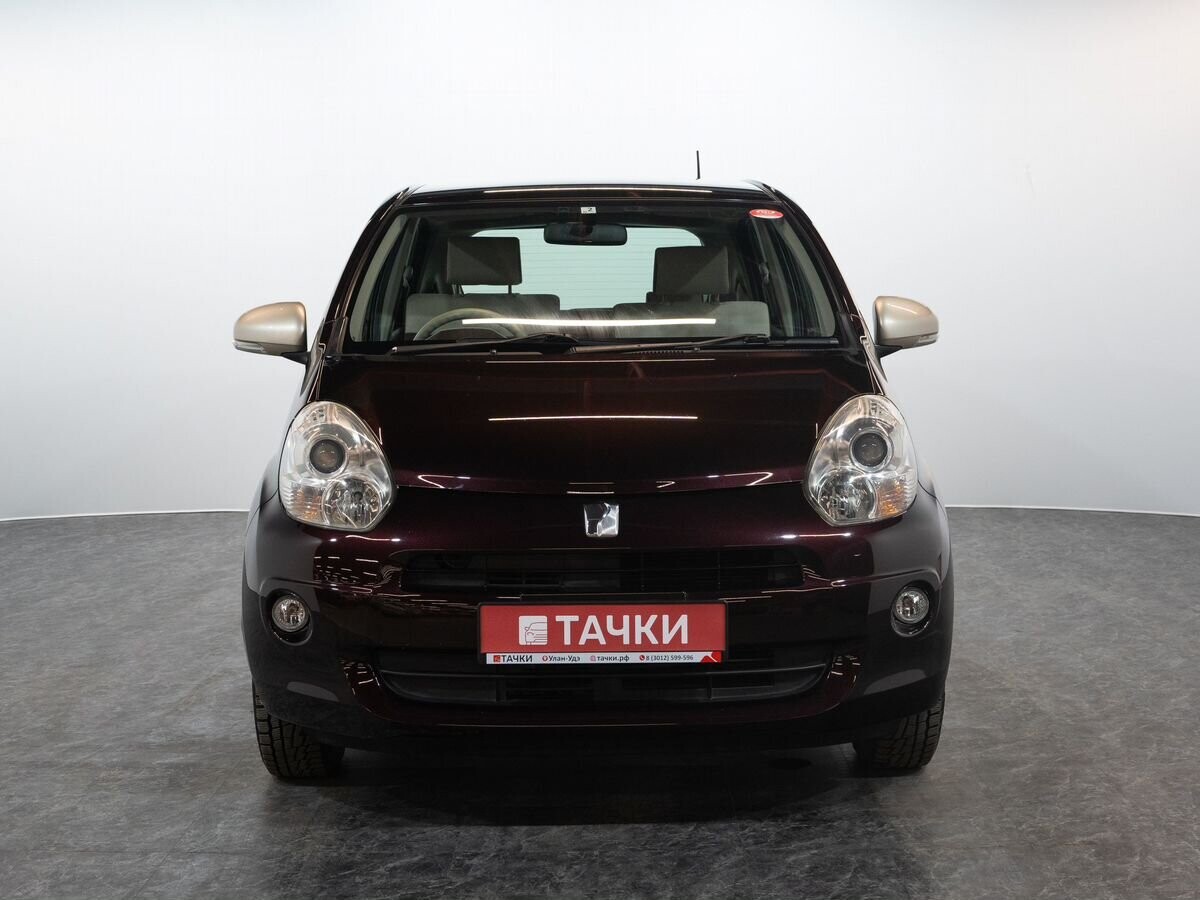 Toyota Passo 2011 - фото автомобиля