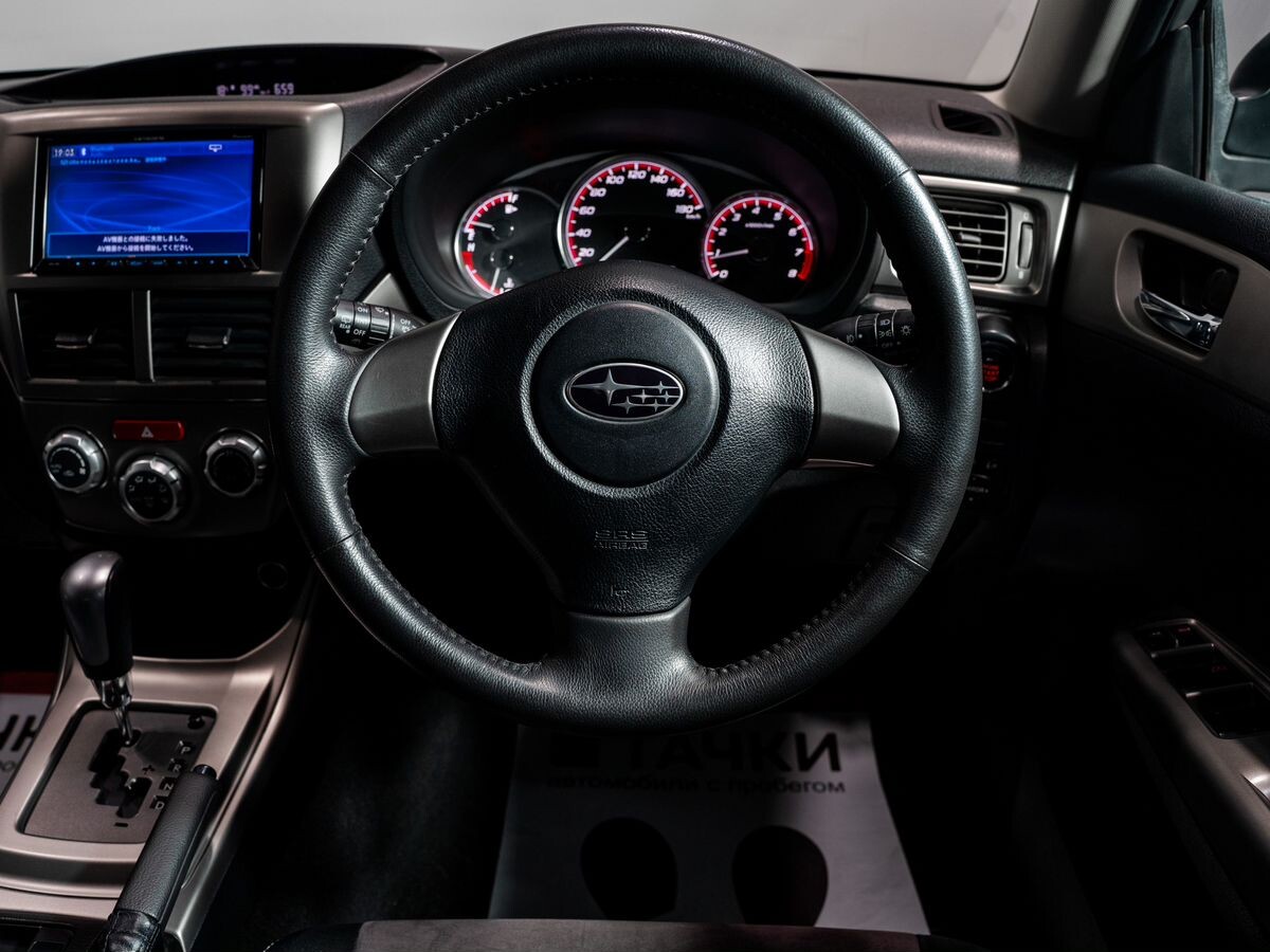Subaru Impreza 2009 - фото автомобиля