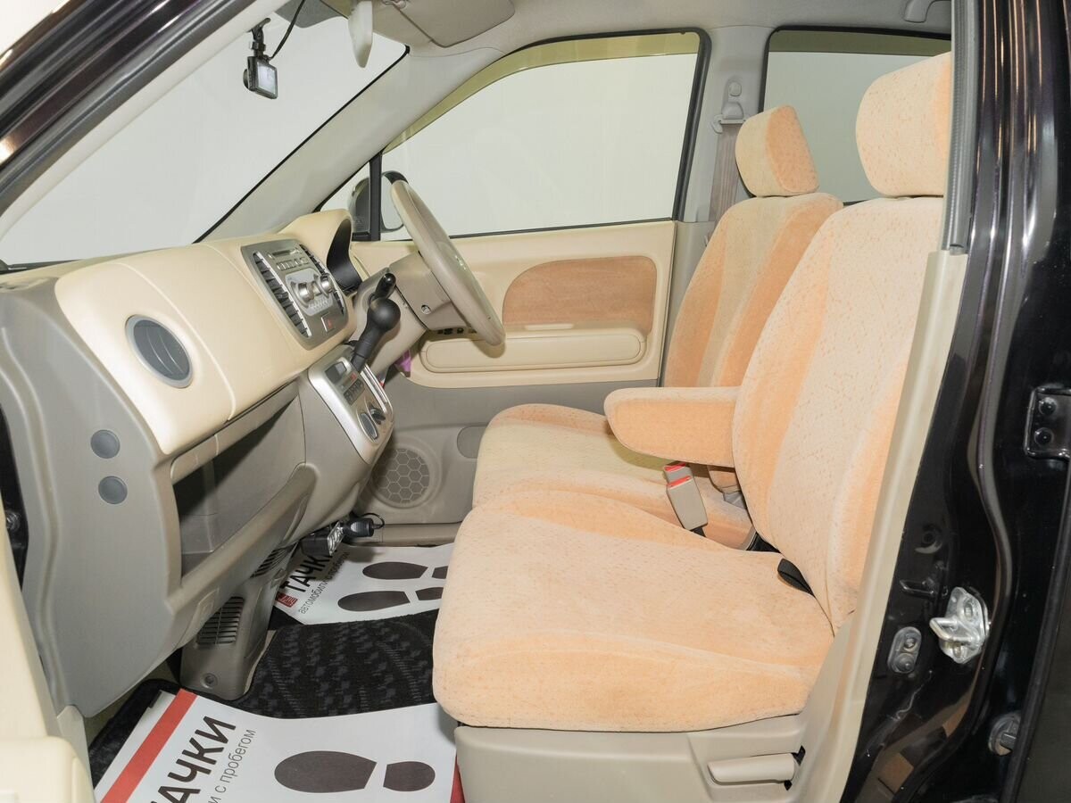 Nissan Moco 2010 - фото автомобиля