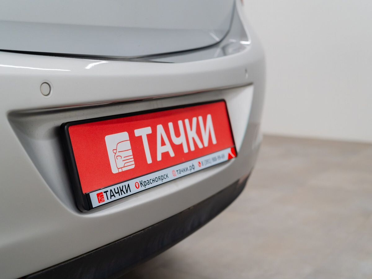 Opel Astra 2011 - фото автомобиля