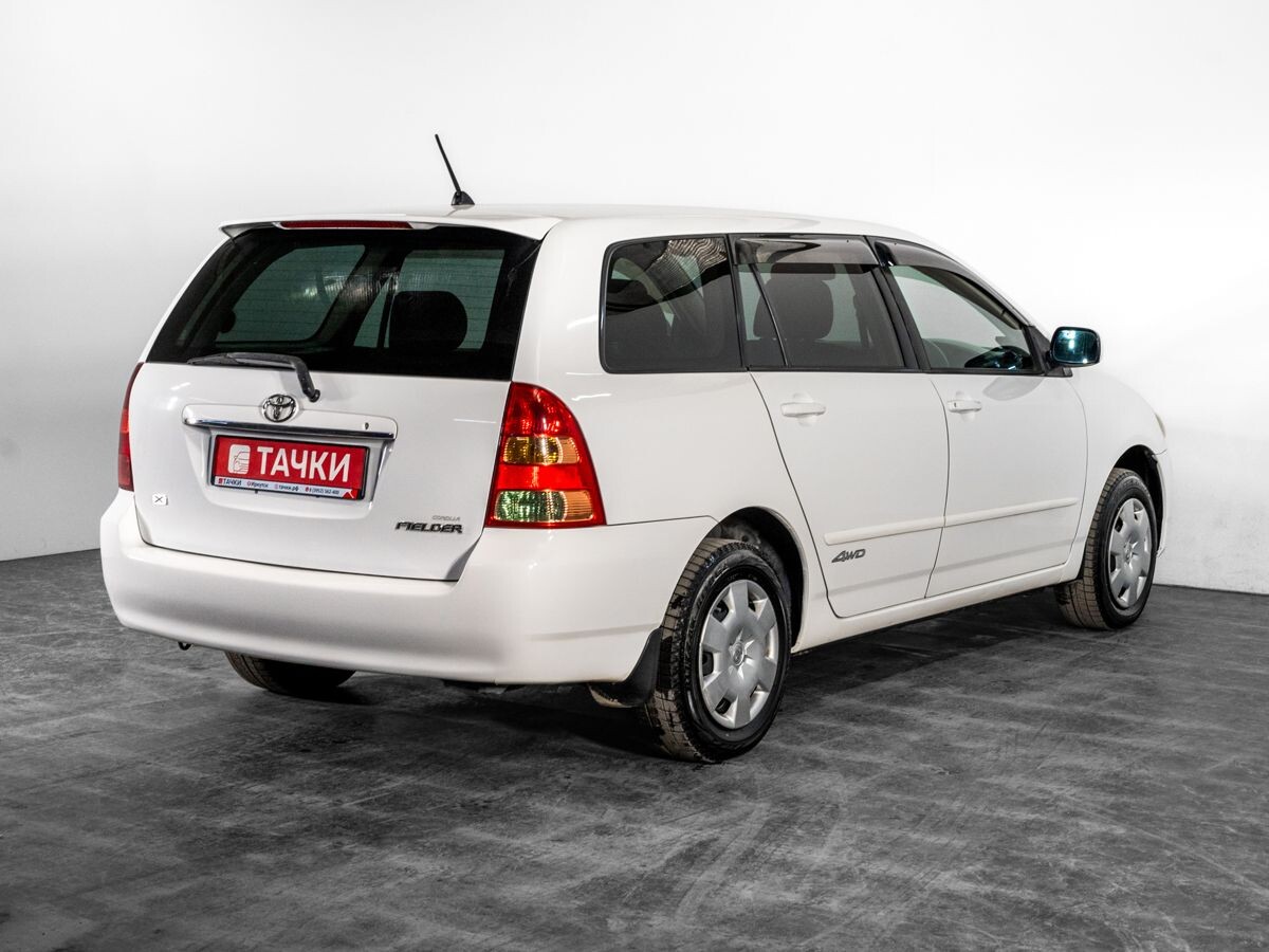 Toyota Corolla 2003 - фото автомобиля