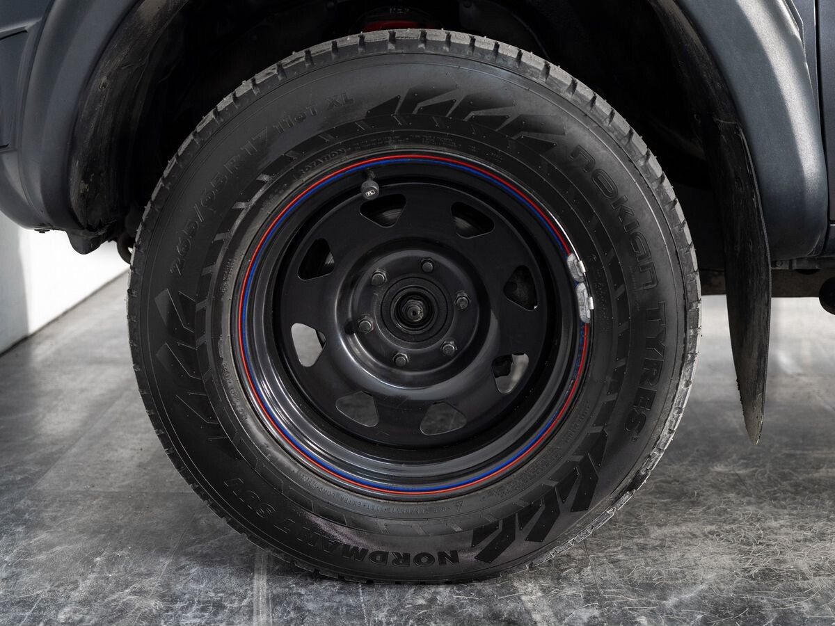 Mitsubishi L200 2010 - фото автомобиля