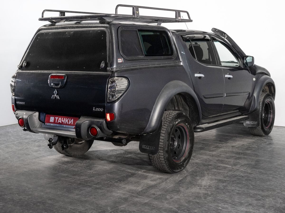 Mitsubishi L200 2010 - фото автомобиля