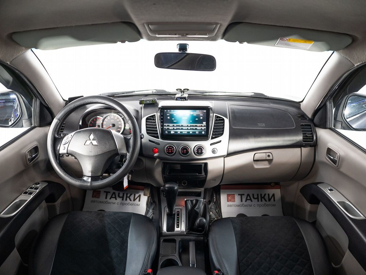 Mitsubishi L200 2010 - фото автомобиля