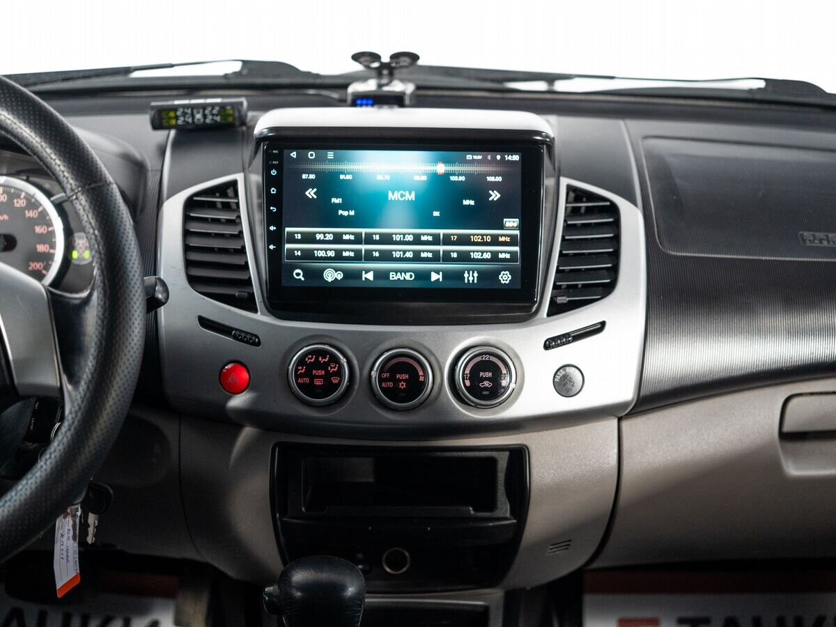Mitsubishi L200 2010 - фото автомобиля