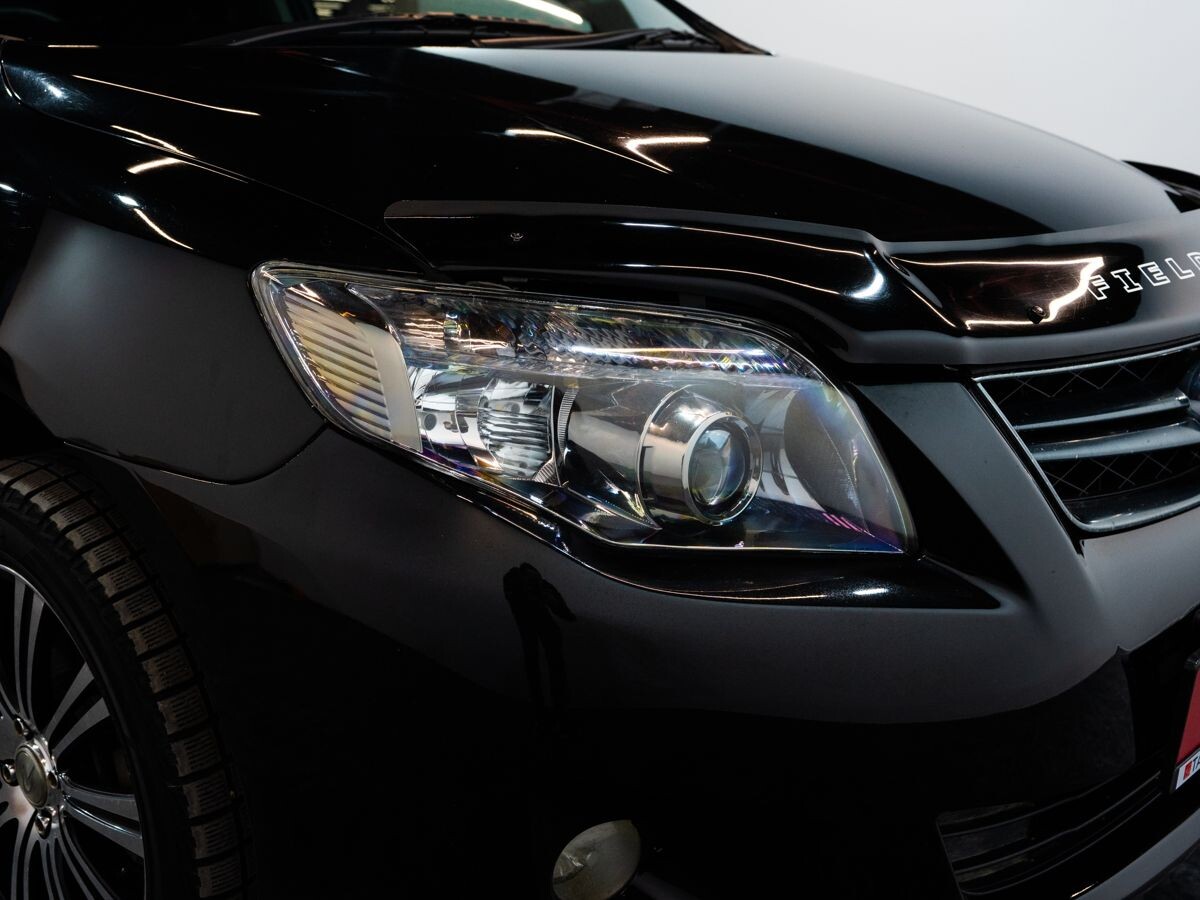 Toyota Corolla 2009 - фото автомобиля