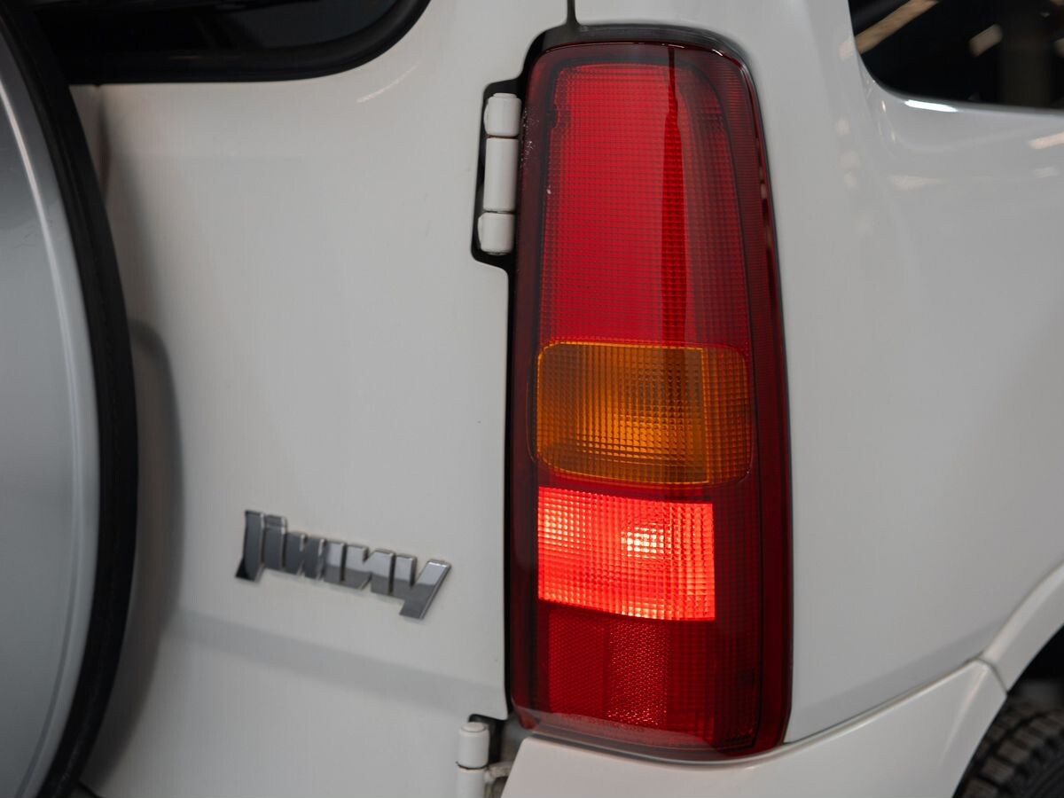 Suzuki Jimny 2011 - фото автомобиля