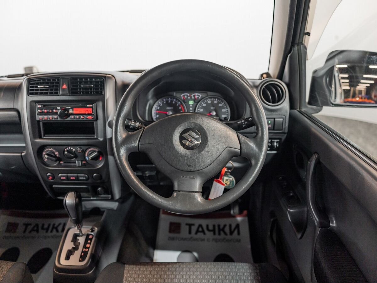 Suzuki Jimny 2011 - фото автомобиля