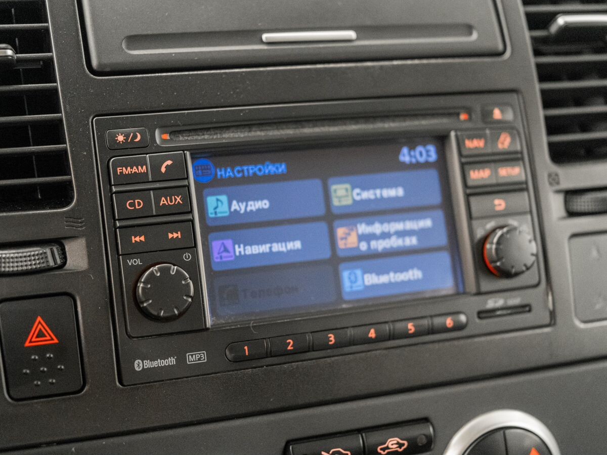 Nissan Tiida 2010 - фото автомобиля