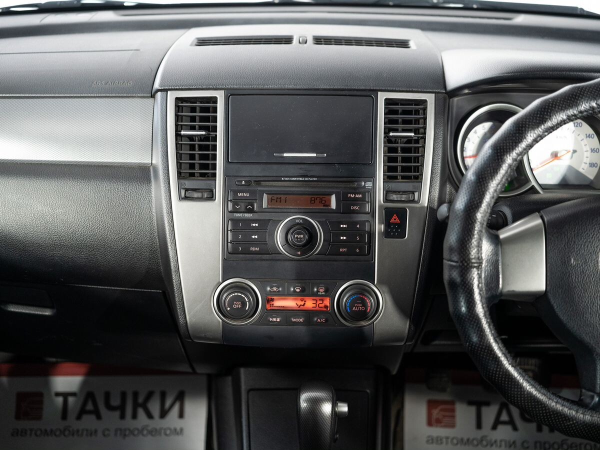 Nissan Tiida 2009 - фото автомобиля