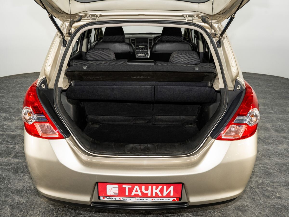 Nissan Tiida 2009 - фото автомобиля