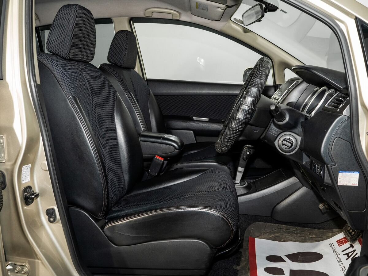 Nissan Tiida 2009 - фото автомобиля