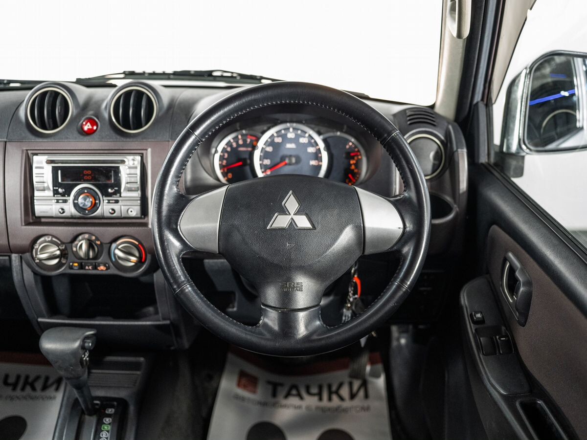 Mitsubishi Pajero Mini 2009 - фото автомобиля