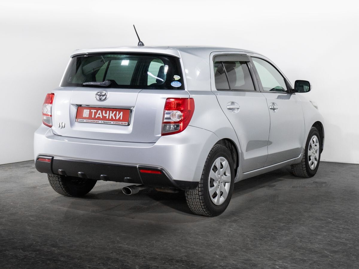 Toyota Ist 2009 - фото автомобиля