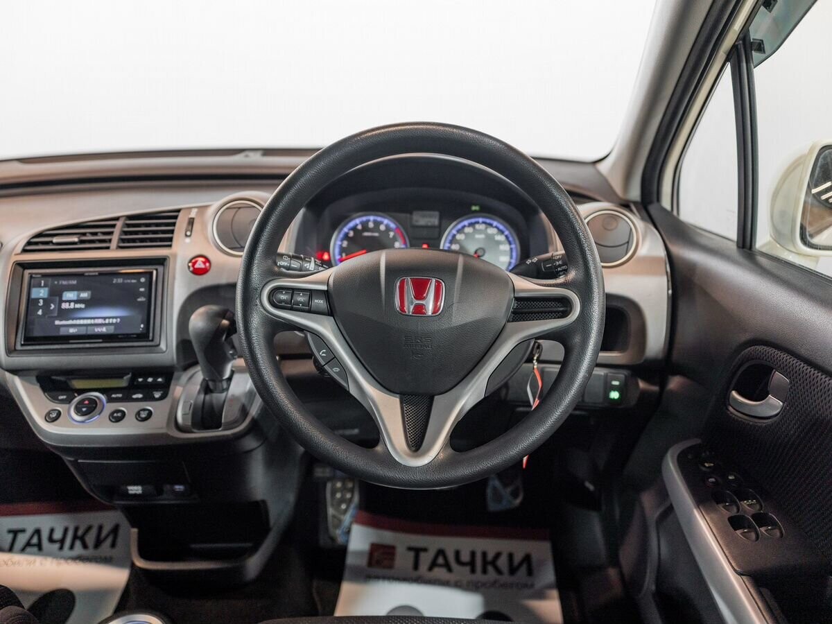 Honda Stream 2009 - фото автомобиля