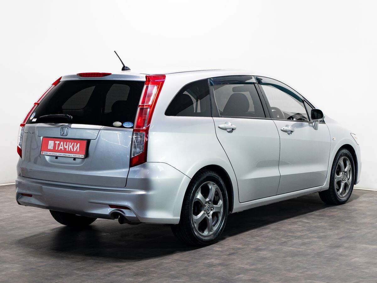 Honda Stream 2010 - фото автомобиля