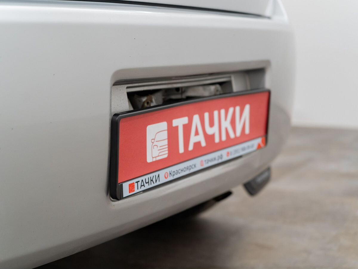 Toyota Porte 2004 - фото автомобиля