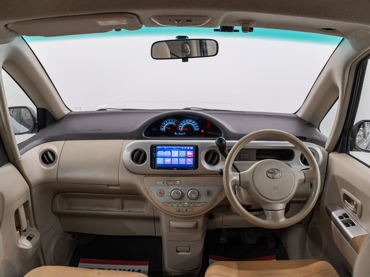 Toyota Porte 2004 - фото автомобиля