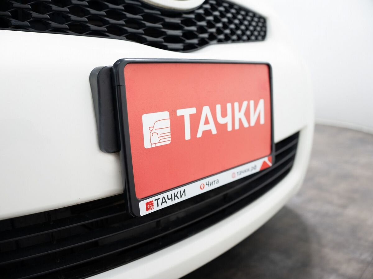 Toyota Vitz 2010 - фото автомобиля