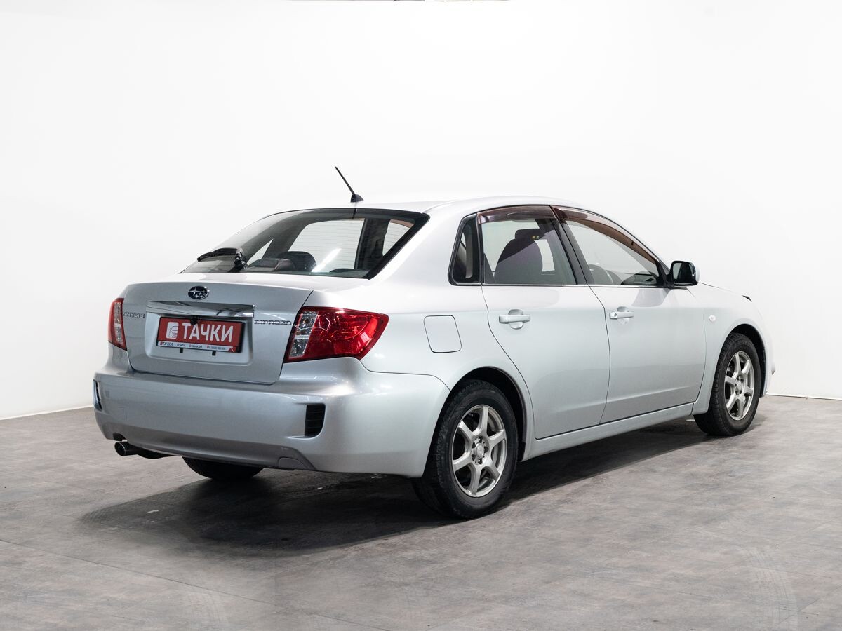 Subaru Impreza 2010 - фото автомобиля