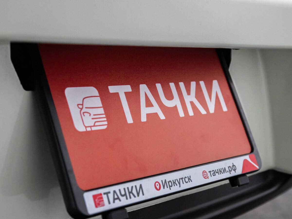 Nissan Tiida 2011 - фото автомобиля