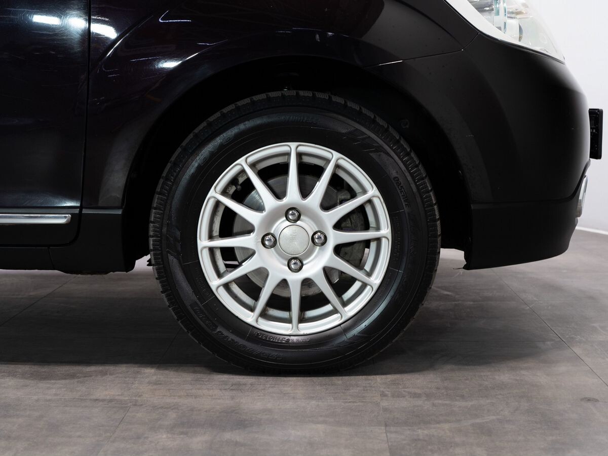 Mazda Verisa 2011 - фото автомобиля