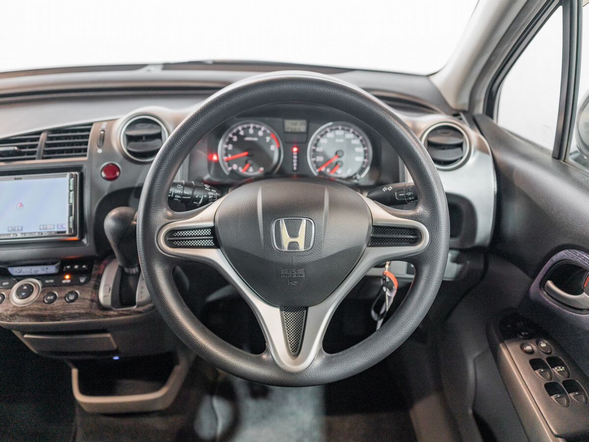 Honda Stream 2010 - фото автомобиля