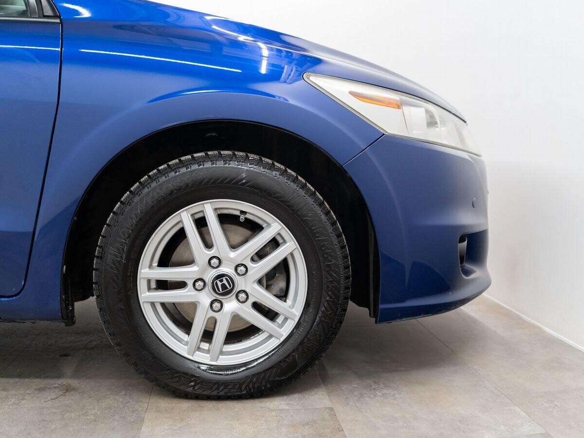 Honda Stream 2009 - фото автомобиля