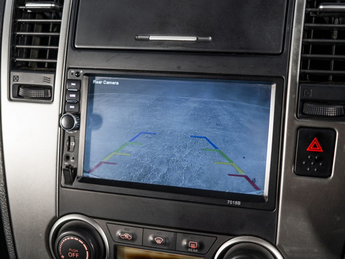 Nissan Tiida 2009 - фото автомобиля