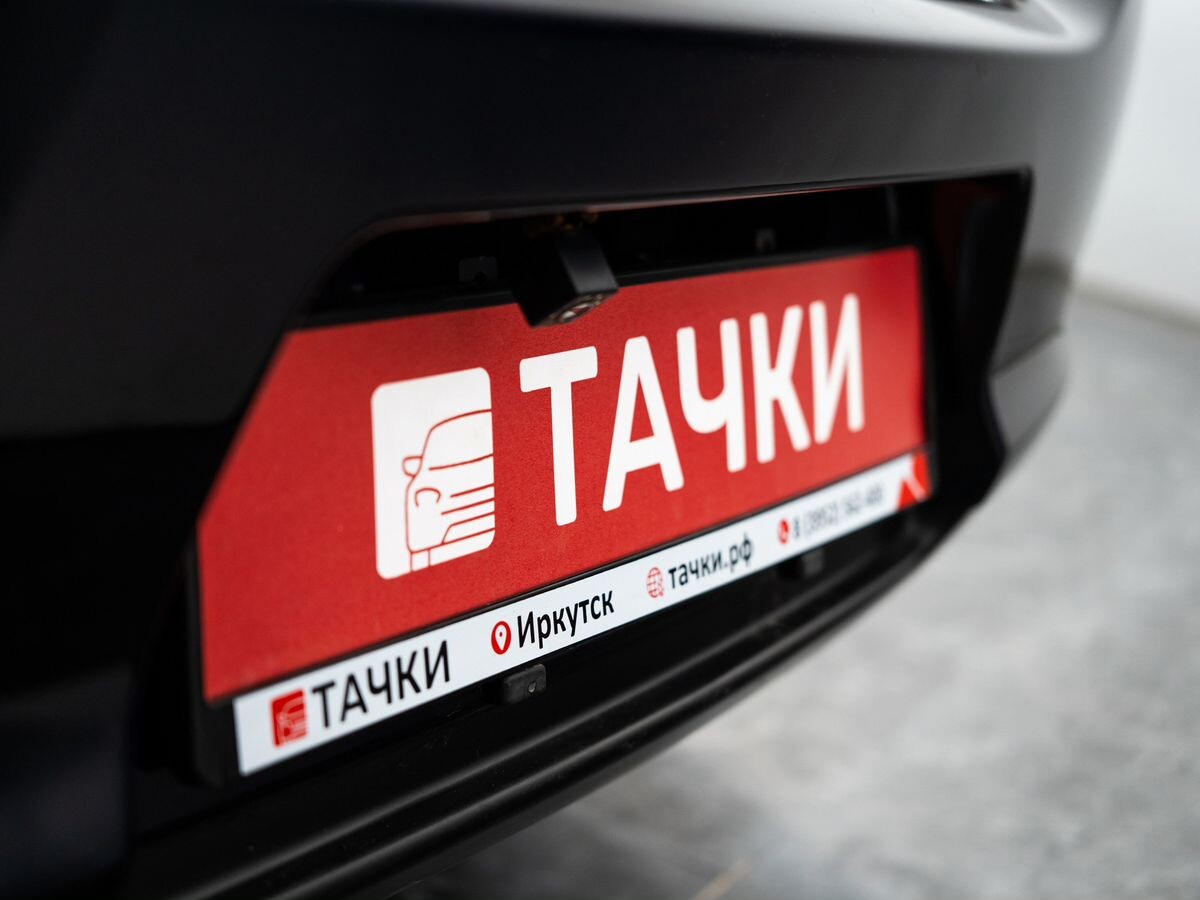 Nissan Tiida 2009 - фото автомобиля