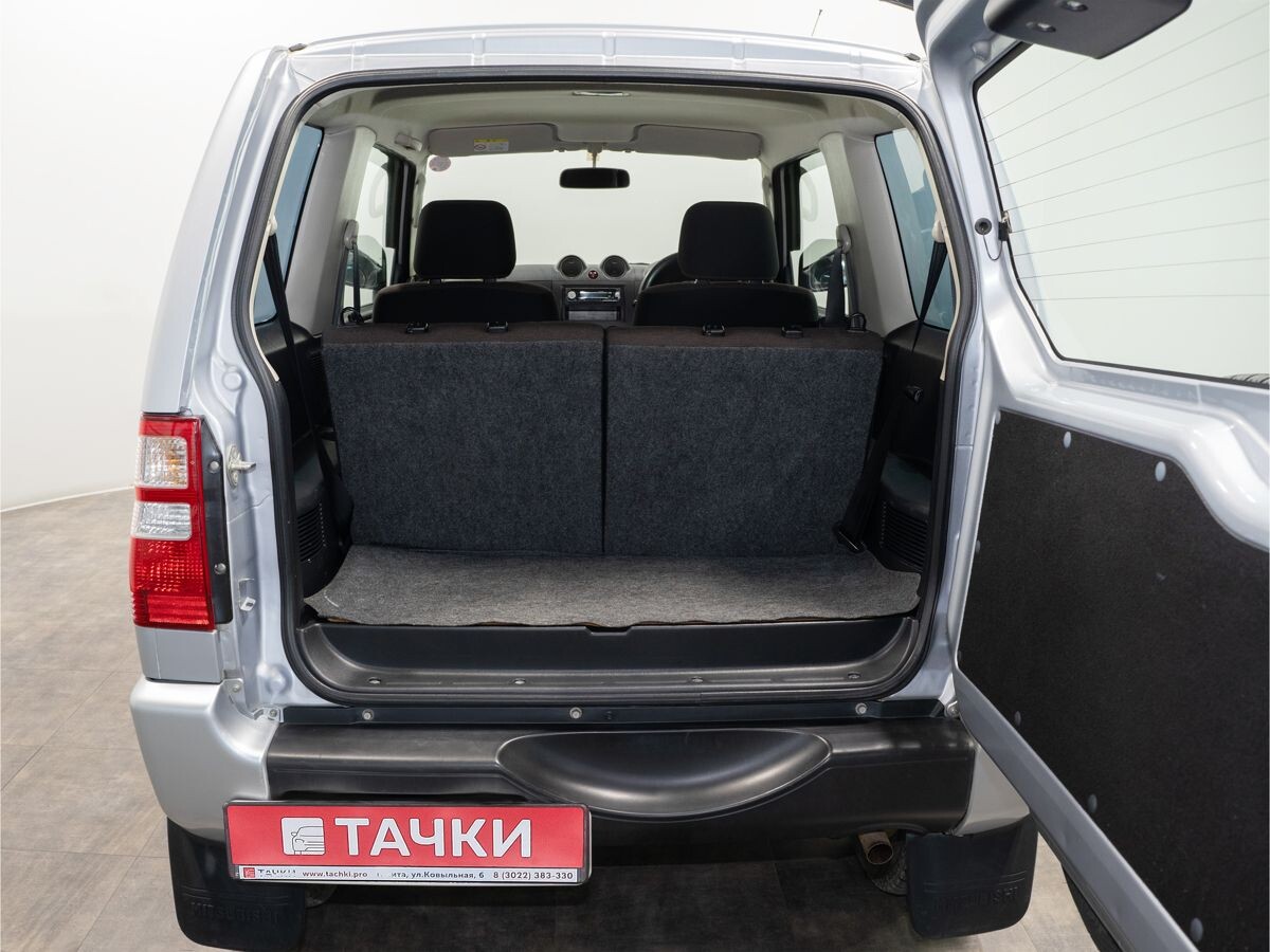 Mitsubishi Pajero Mini 2010 - фото автомобиля