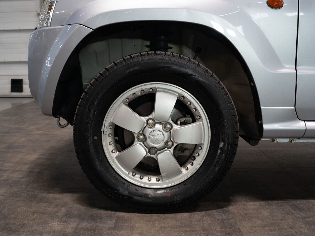 Mitsubishi Pajero Mini 2010 - фото автомобиля